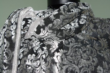 Damask textured velvet fabric.